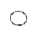 Load image into Gallery viewer, Unique industrial sterling silver bicycle-style chain bracelet. Every other link features a textured black finish with a 3mm tube soldered in the center on both sides and the alternate link is smooth and polished. Each link is connected by roughly finished rivets. Top view of braceletm it is closed and positioned in a circle on a white background. 
