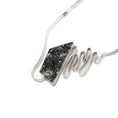 Load image into Gallery viewer, A modernist inspired handmade sterling silver necklace showcasing an undulating bar on the left side, mimicking soundwaves, culminating at the left side of an asymmetric pentagon hollowform. The hollowform has a blackened, heavily textured surface, evoking a brutalist sensibility. Emerging from the bottom of the hollowform, the silver bar creates the illusion of continuity as it curves upward, connecting to a bar and link chain. Pendant is angled and focus is on the textured black hollowform
